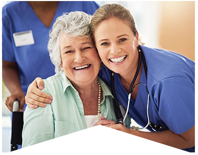 A nurse and patient smiling